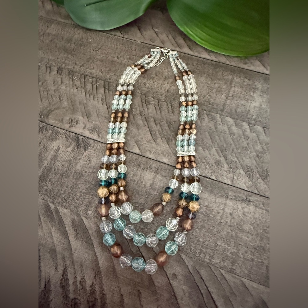 Elegant Beaded Necklace with Brown and Teal Accents